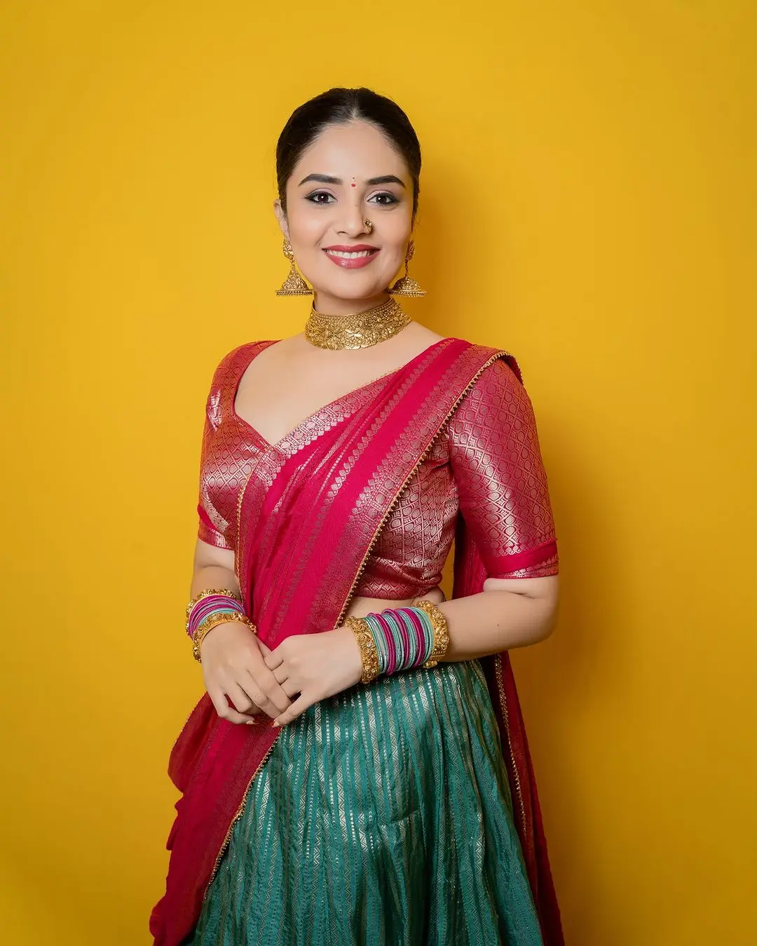 Telugu Actress Sreemukhi Stills In Green Lehenga Choli